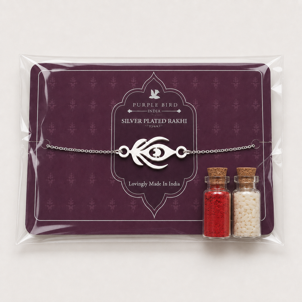 Purple Bird ‘Mor Pankh’ Silver-Plated Rakhi Bracelet (with Roli Chawal Set)