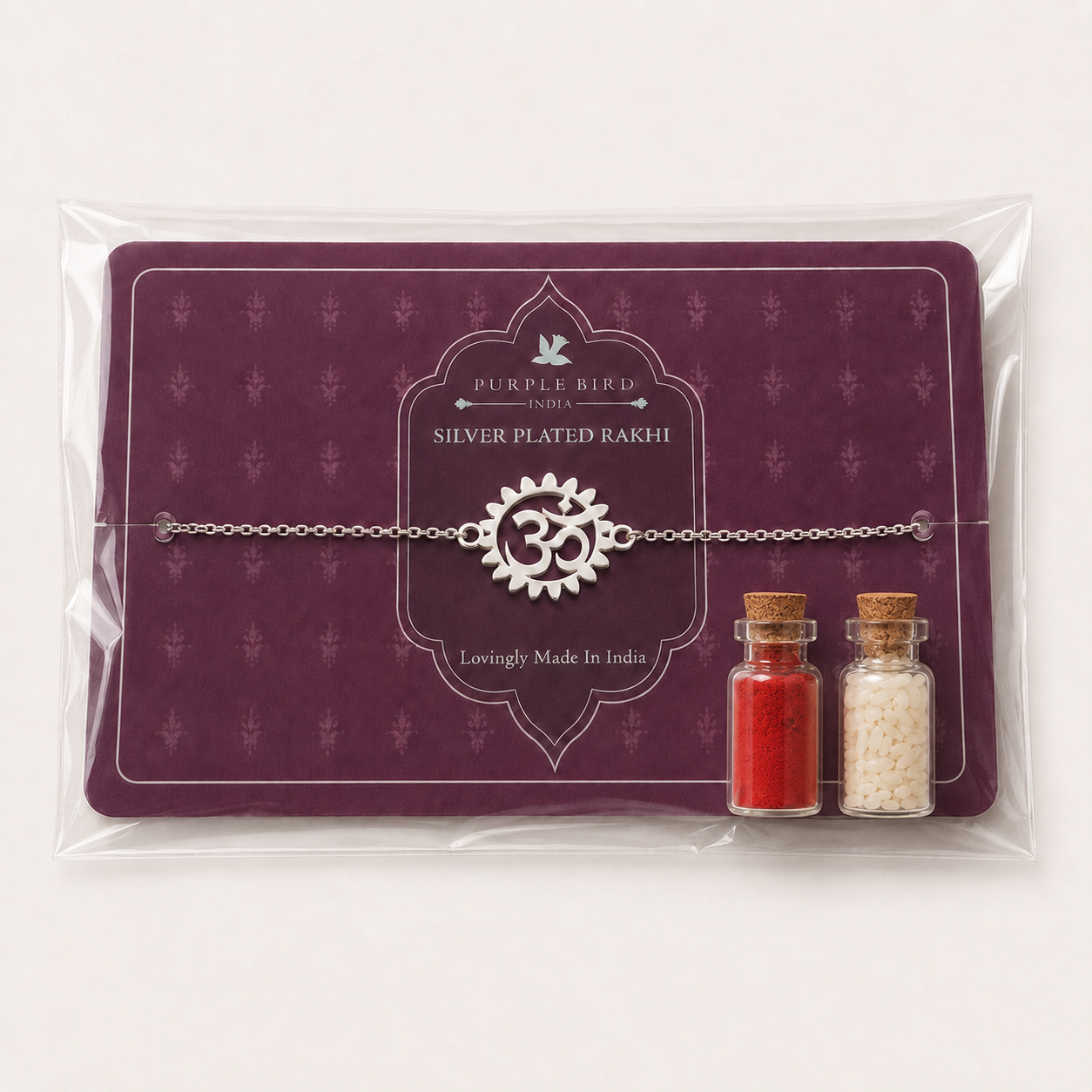 Purple Bird ‘Om Prabha’ Silver-Plated Rakhi Bracelet (with Roli Chawal Set)