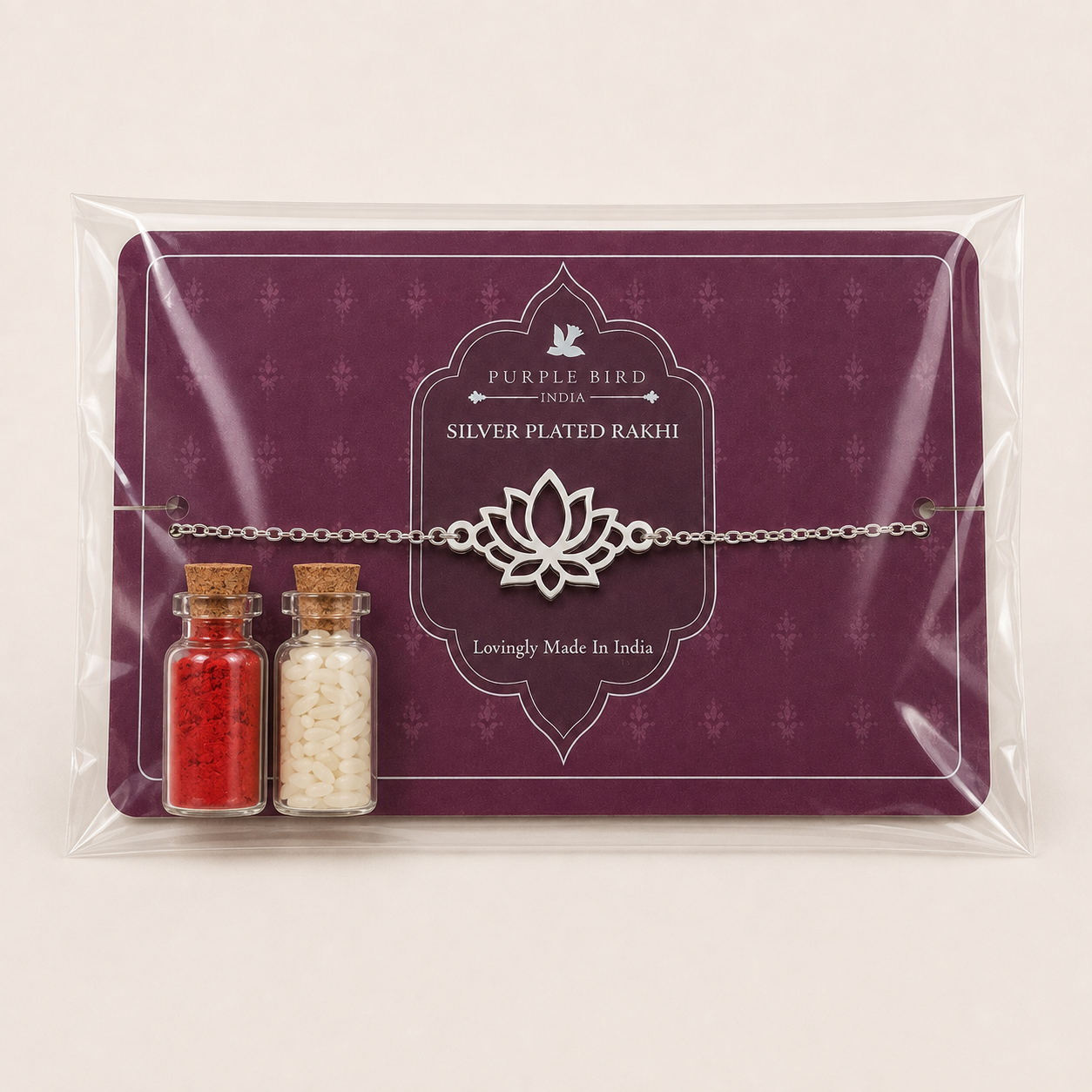 Purple Bird ‘Kamal Kiran’ Silver-Plated Rakhi Bracelet (with Roli Chawal Set)