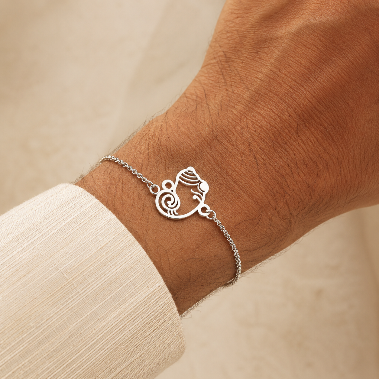 Purple Bird ‘Shubh Ganesh’ Silver-Plated Rakhi Bracelet (with Roli Chawal Set)